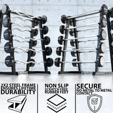 Two Synergee fixed barbell storage racks with black steel frames holding multiple barbells with curved and straight bars, displayed against a concrete wall. Feature callouts highlight steel frame durability, non-slip rubber feet, and secure metal-...