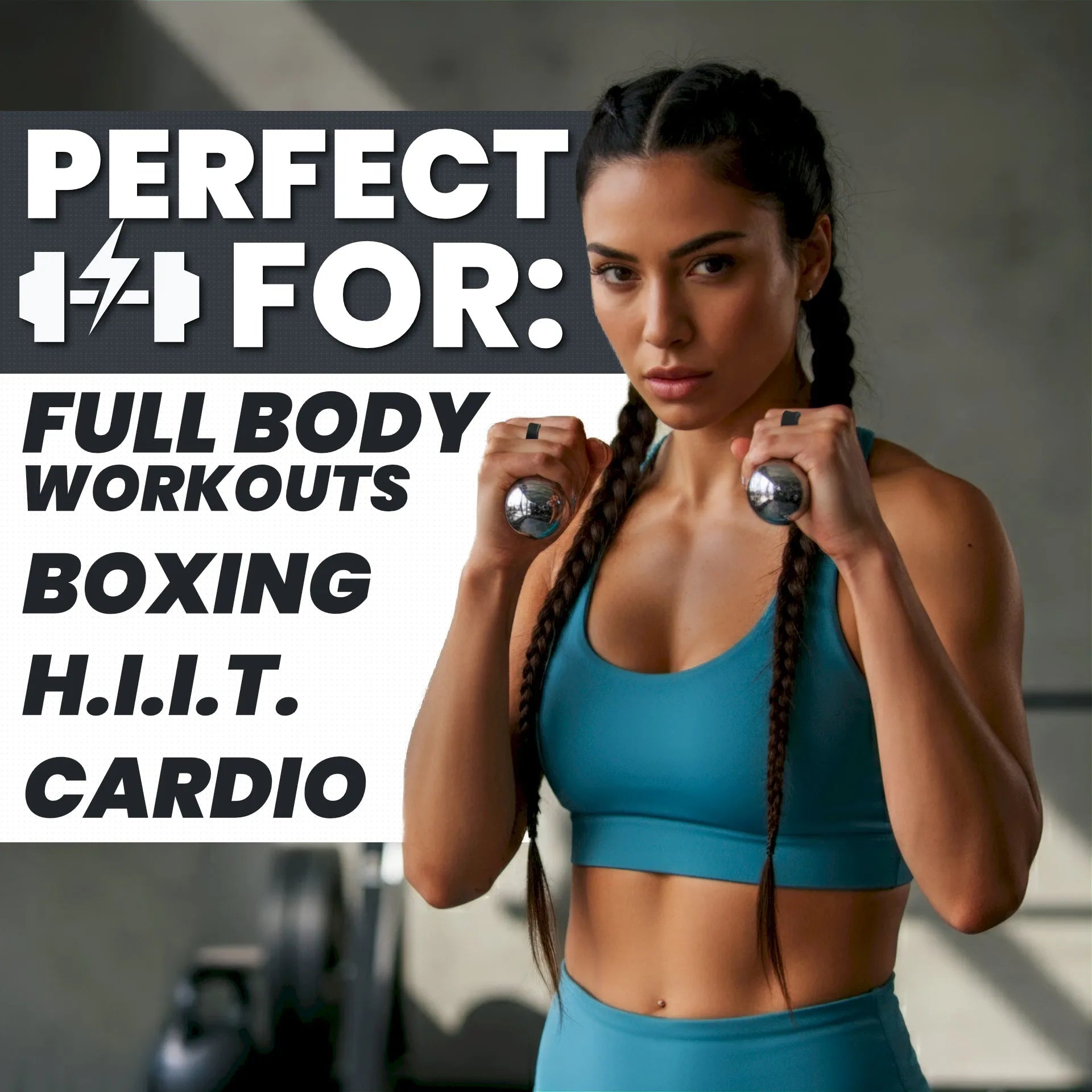 Woman in a blue sports bra and leggings holding a pair of gray hand weights in a boxing stance in a gym setting.