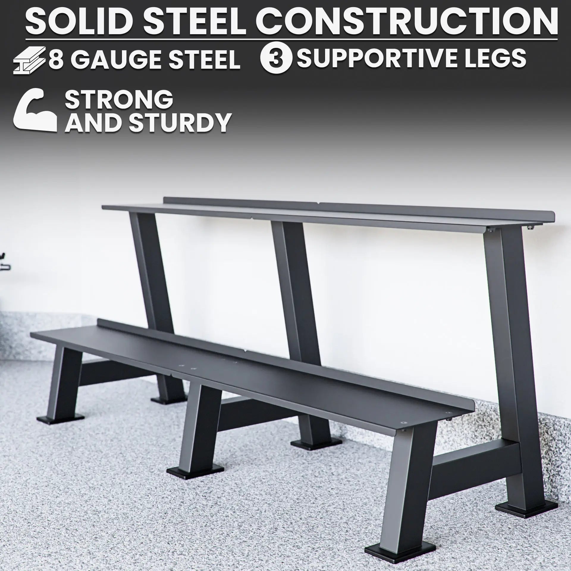Dark gray steel weight plate storage rack with two horizontal shelves and three supportive legs on a concrete floor.