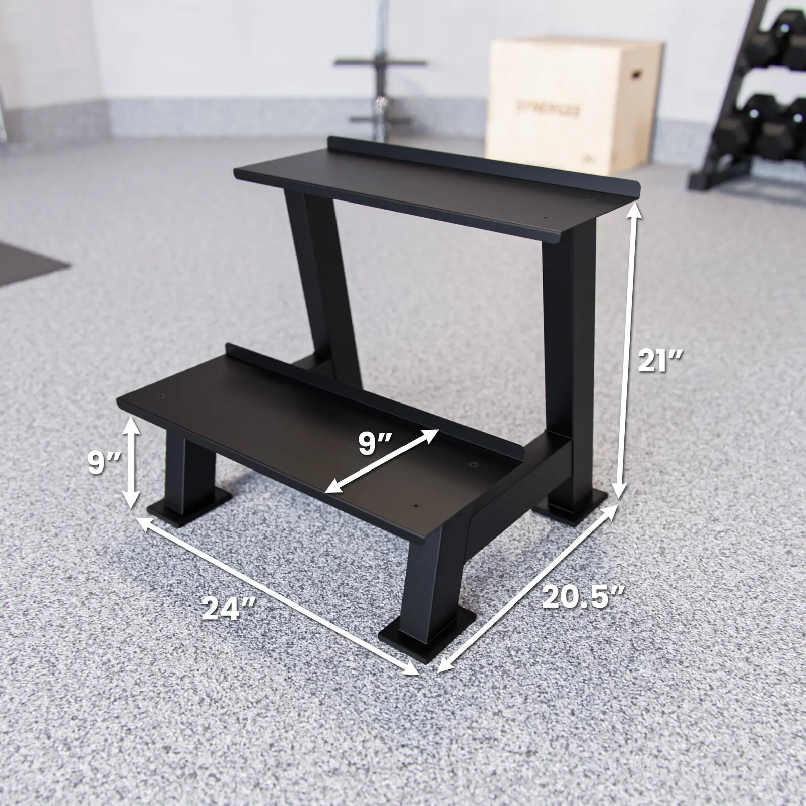Black two-tier weight plate and kettlebell storage rack with solid steel construction. Dimensions marked: 24" length, 20.5" depth, 21" height, and 9" shelf spacing.
