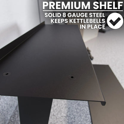 Black steel kettlebell storage rack with solid 8 gauge steel construction and mounting holes visible on the flat surface.