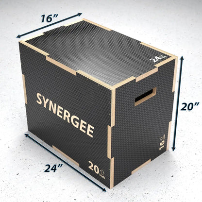 Black rubber-topped wooden plyo box with natural wood frame and handles, measuring 24" x 20" x 16" with textured non-slip surface on top and sides.