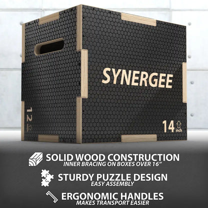 Black hexagonal-patterned wooden plyo box with natural wood frame and handles, labeled "SYNERGEE" and marked "14 inch" height.