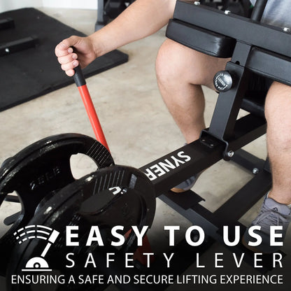 Man using a black seated calf raise machine with red handle and weight adjustment dial visible on the side.