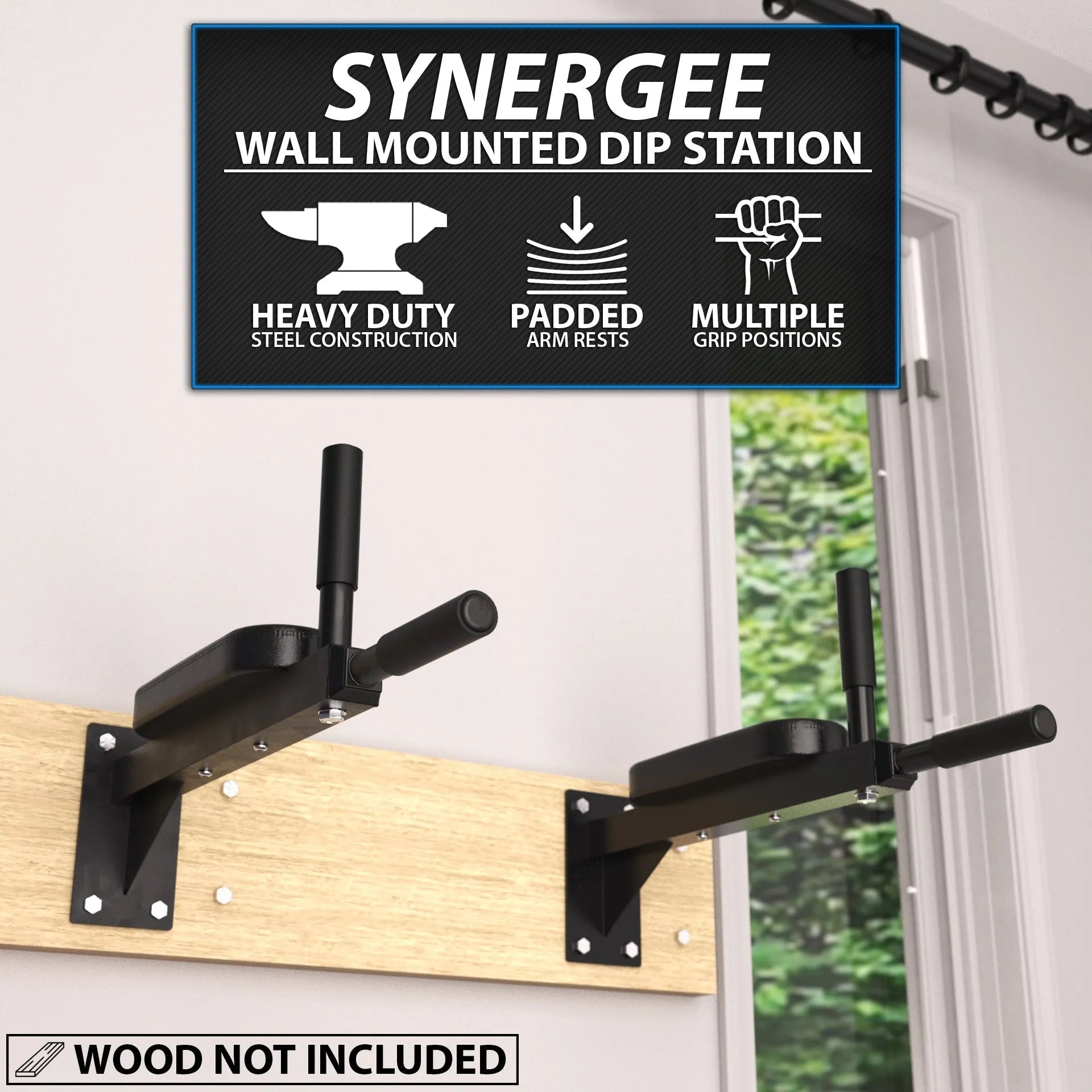 Black steel wall-mounted dip station with padded arm rests and multiple grip positions, mounted to a wooden beam against a white wall with a window.