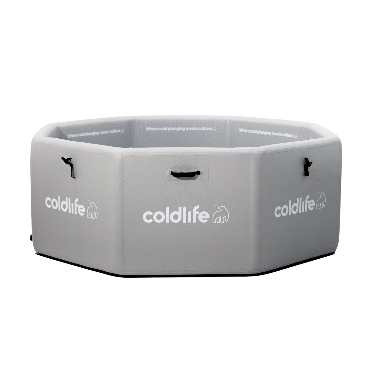 An octagonal cold plunge tub in light gray with the logo 'coldlife' printed on the side, featuring handles for easy transport and text that reads 'Where cold plunging meets culture' inside.