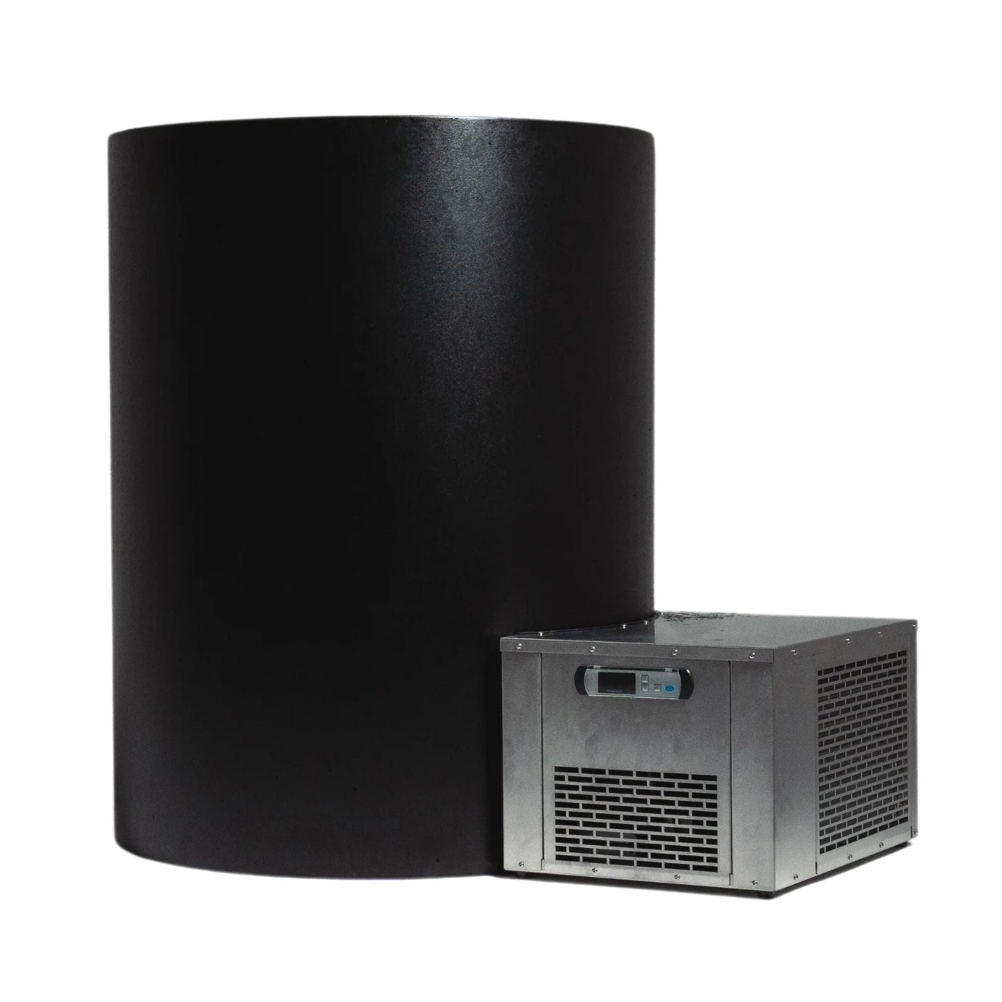 A large black cylindrical object next to a smaller metallic unit with a digital display and ventilation grilles, possibly representing a sound system or equipment.
